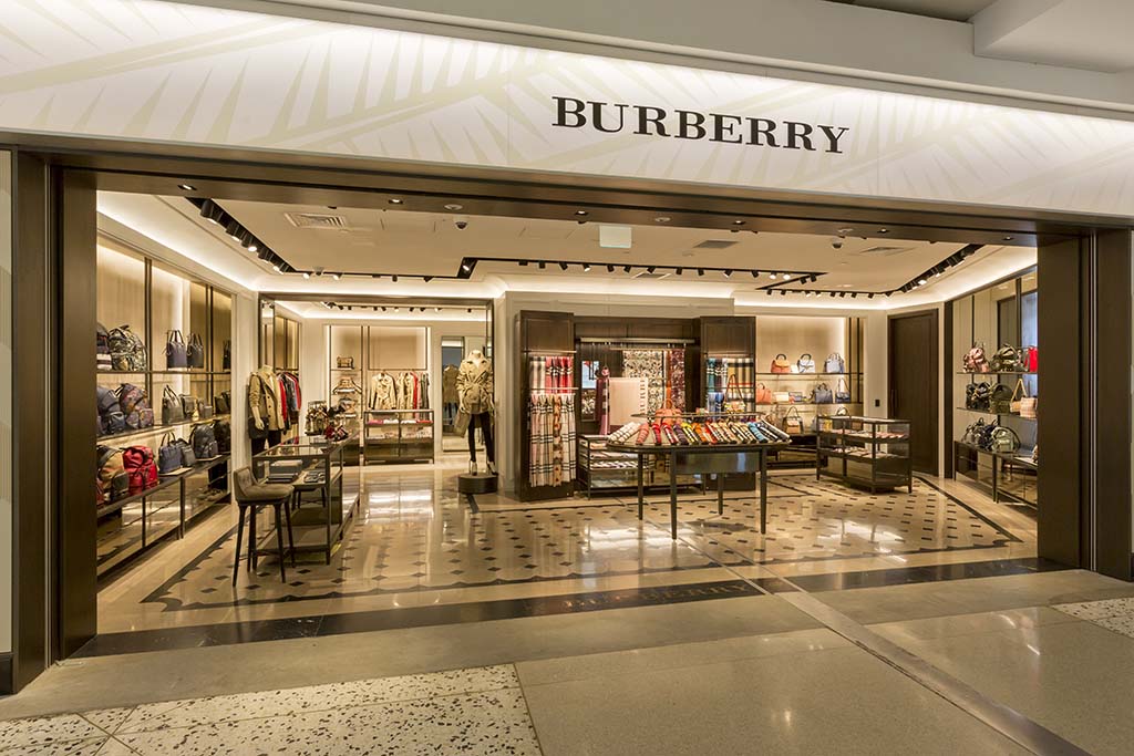 Burberry Venerable British brand founded in 1856 known for its trench coats, cashmere scarves & iconic check.  Open 6:45 am – 10:45 pm  7:00 am-3:30 pm (Wed, Fri)