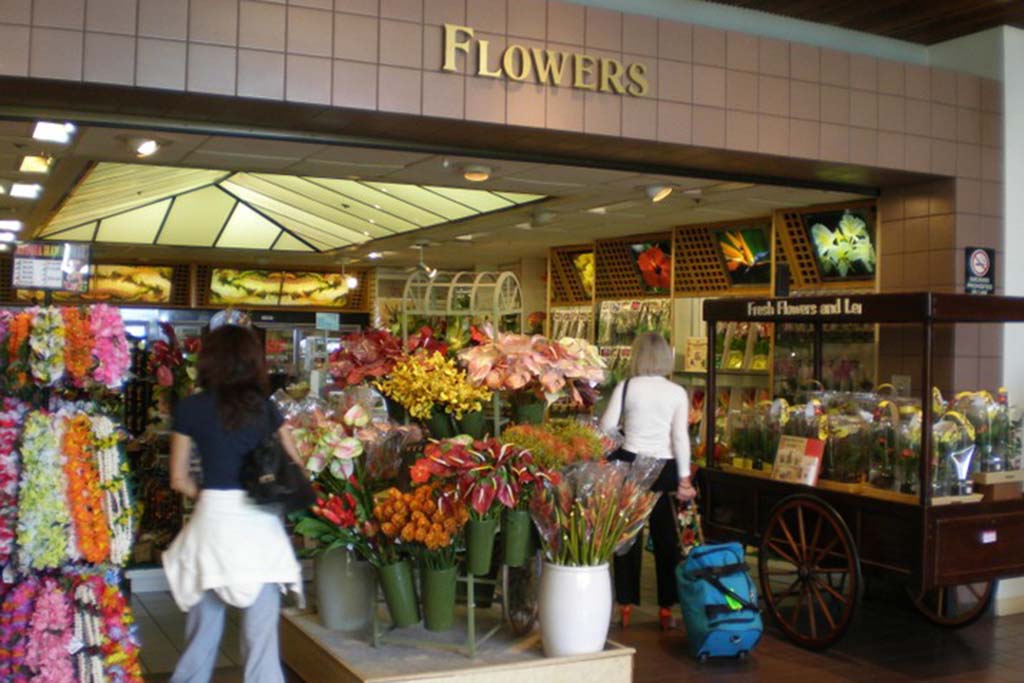 Flowers Fresh and artificial flowers, lei, gifts, Hawaiian plant roots.  Open daily 6:00 a.m. – 10:30 p.m.